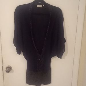 Women's dress/top, size large, 90%rayon, machine washable. Black with Gold trim.